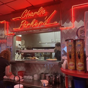 Charlie Parkers - a woman working behind the counter - Diners Near Me - Springfield, Illinois Charlie Parkers - a woman working behind the counter - Diners Near Me - Springfield, Illinois
