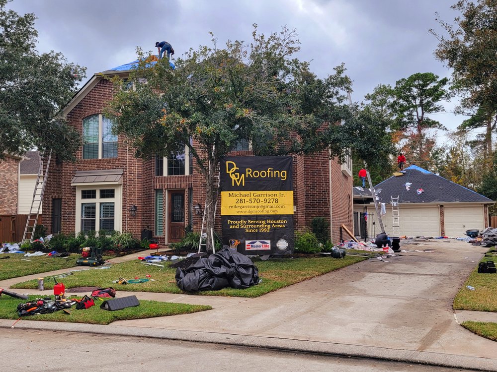 Slide of DGM Roofing