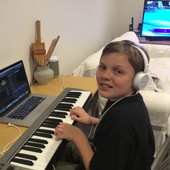 Marin Piano Studio - Student composing his own music, using Garageband, during weekly Music Lab. - Musical Instruments & Teachers Near Me Marin Piano Studio - Student composing his own music, using Garageband, during weekly Music Lab. - Musical Instruments & Teachers Near Me