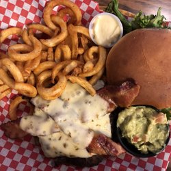 Single Jack Restaurant - Boss's Burger with pepper jack cheese, bacon and guacamole! Comes with option of free cheese, and 2 free extra toppings.