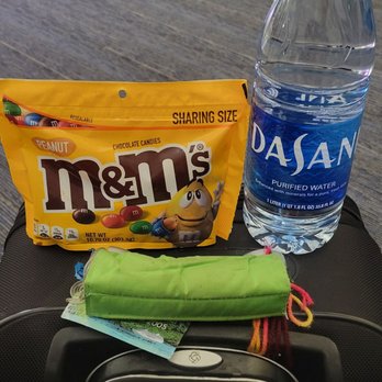 Market8600 - Peanut M&Ms 10.70oz Bag $9.49, Dasani 1 Liter Bottle $3.89 (12/19/21). @FlyLAXAirport #LAX @MMsChocolate @DasaniWater #Candy #Water #Snacks - Convenience Stores Near Me - Los Angeles, California