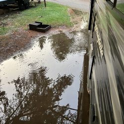 Yellowstone Park / West Entrance KOA - This is our site about 90 minutes after check-in after a downpour.