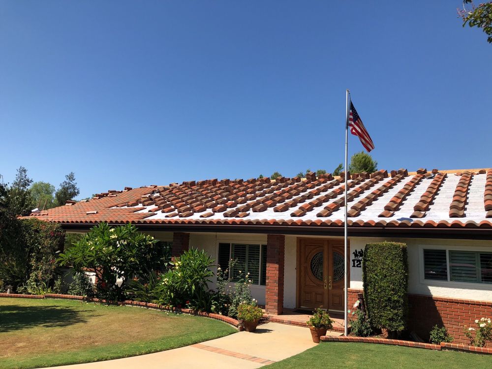 Slide of Tony's Roofing