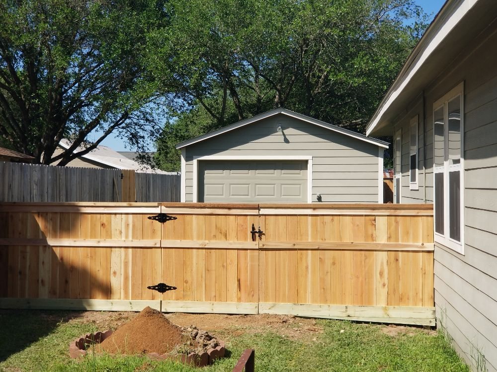 Slide of Pride of Texas Roof and Fence