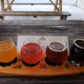 Low Tide Brewing - A nice little flight of four current pours. - Breweries Near Me - Johns Island, South Carolina Low Tide Brewing - A nice little flight of four current pours. - Breweries Near Me - Johns Island, South Carolina