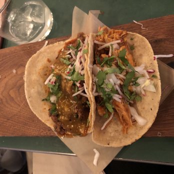 Rosie's - Bistec - steak taco ($4)(left), tinga de pollo - chicken taco ($5)(right) - Mexican Near Me - New York, New York Rosie's - Bistec - steak taco ($4)(left), tinga de pollo - chicken taco ($5)(right) - Mexican Near Me - New York, New York
