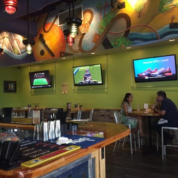 Mellow Mushroom Mount Dora - Bar area with TV's - Pizza Near Me - Mount Dora, Florida Mellow Mushroom Mount Dora - Bar area with TV's - Pizza Near Me - Mount Dora, Florida