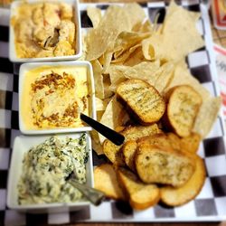 Fat Daddy's Pub & Grille - Dip trio: spinach,  spicy cream and fat daddy's queso