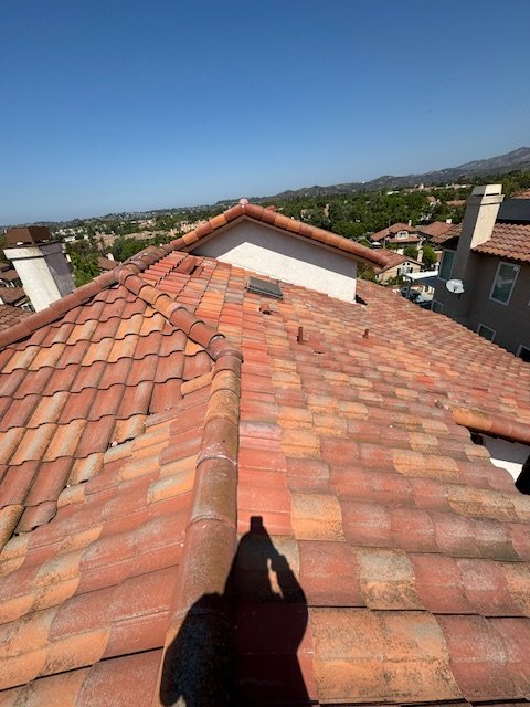 Slide of MMM Roofing