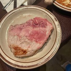 Rusty's Pancake & Steakhouse - Pork steak; please check your food before consuming.