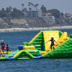 Long Beach Local News - inflatable water playgrounds at local beaches