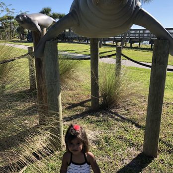 Manatee Sanctuary Park - Manatee sculpture and toddler photo op - Parks Near Me - Cape Canaveral, Florida Manatee Sanctuary Park - Manatee sculpture and toddler photo op - Parks Near Me - Cape Canaveral, Florida