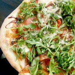 Prosciutto arugula pizza. Love the balsamic glaze! ($15) Prosciutto arugula pizza. Love the balsamic glaze! ($15)