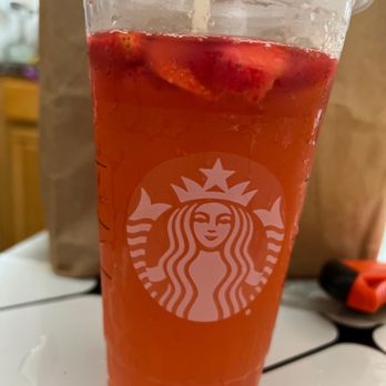 Starbucks - a plastic cup with strawberries in it - Coffee & Tea Near Me - Queens, New York