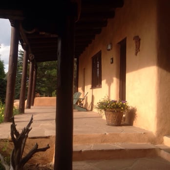 Old Taos Guesthouse - Entrance to rooms overlooking courtyard. - Hotels Near Me - Taos, New Mexico Old Taos Guesthouse - Entrance to rooms overlooking courtyard. - Hotels Near Me - Taos, New Mexico