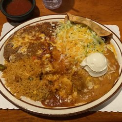 El Toreo Far West - 3 item combo with a hard shell shredded beef taco, cheese enchilada and chile relleno accompanied with rice and refried beans.