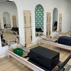 Charis Pilates - Brand new state of the art reformers by Balanced Body with the infinity bar!