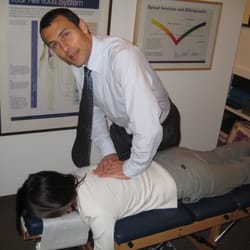 The Lambeth Spine Centre - Dr Brian performing a chiropractic adjustment