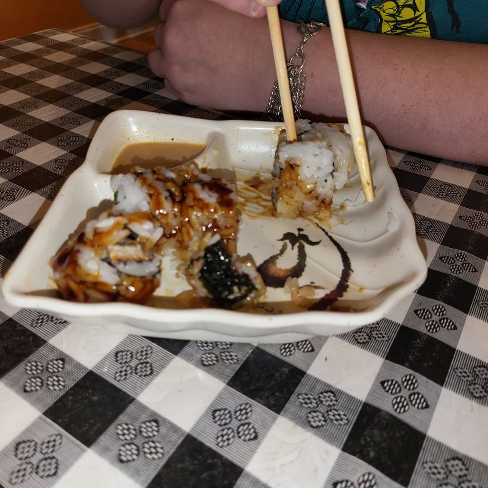Yoshi Japanese Restaurant - a plate of food with chopsticks - Japanese Near Me - Seneca, South Carolina Yoshi Japanese Restaurant - a plate of food with chopsticks - Japanese Near Me - Seneca, South Carolina