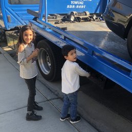 My kids having a good time loading up the car with Rich!