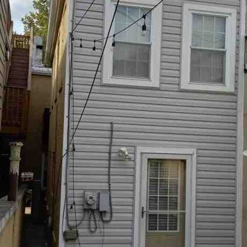 Luna Roofing & Siding - a view of a two story house - Roofing Near Me - Baltimore, Maryland