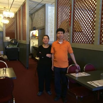 Tidbit Restaurant - a man and a woman standing in a restaurant - Chinese Near Me - Carman, Manitoba Tidbit Restaurant - a man and a woman standing in a restaurant - Chinese Near Me - Carman, Manitoba