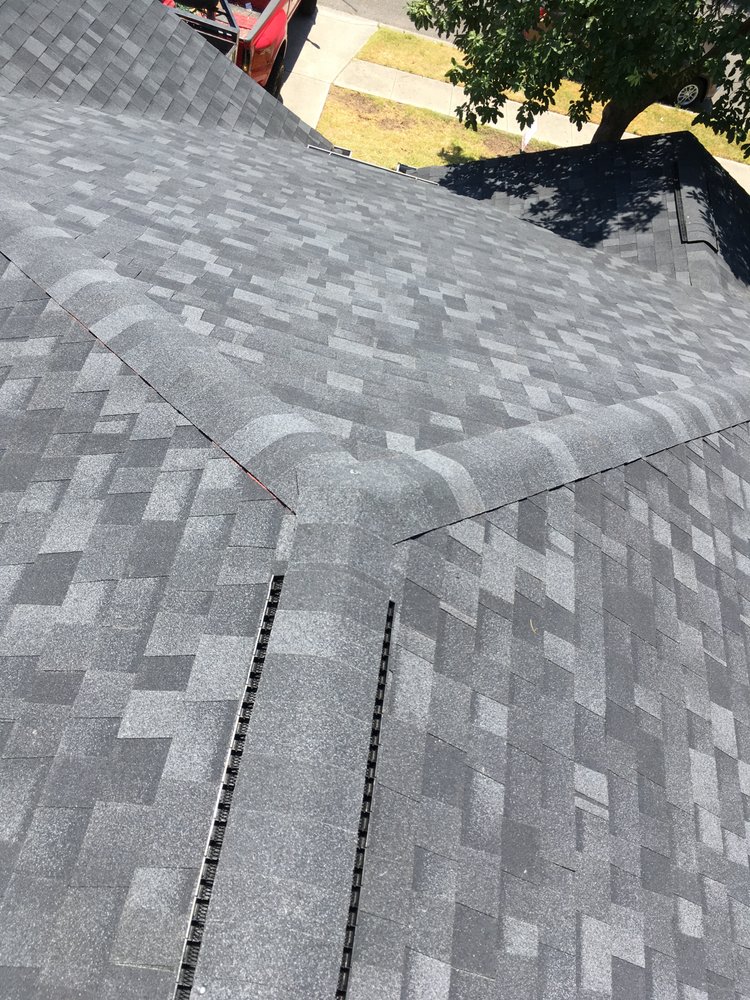 Slide of Monumental Roofing Services