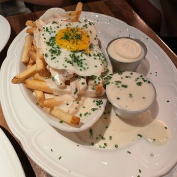 Au Cheval - Crispy Fries with Mornay Fried Farm Egg, Mornay & Garlic Aioli - Burgers Near Me - New York, New York Au Cheval - Crispy Fries with Mornay Fried Farm Egg, Mornay & Garlic Aioli - Burgers Near Me - New York, New York