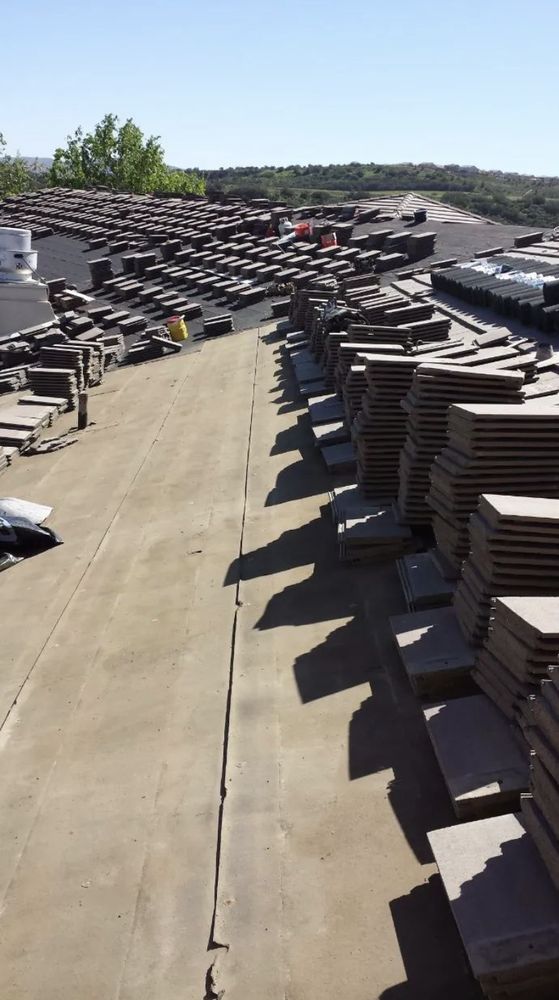 Slide of Romero's Roofing