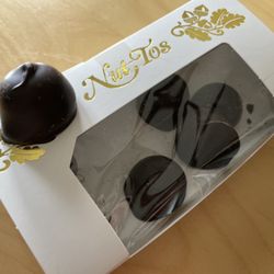 Nut Tos - Maple cream dark chocolate... chocolates. (there were more in the box, I just ate several before the photo)