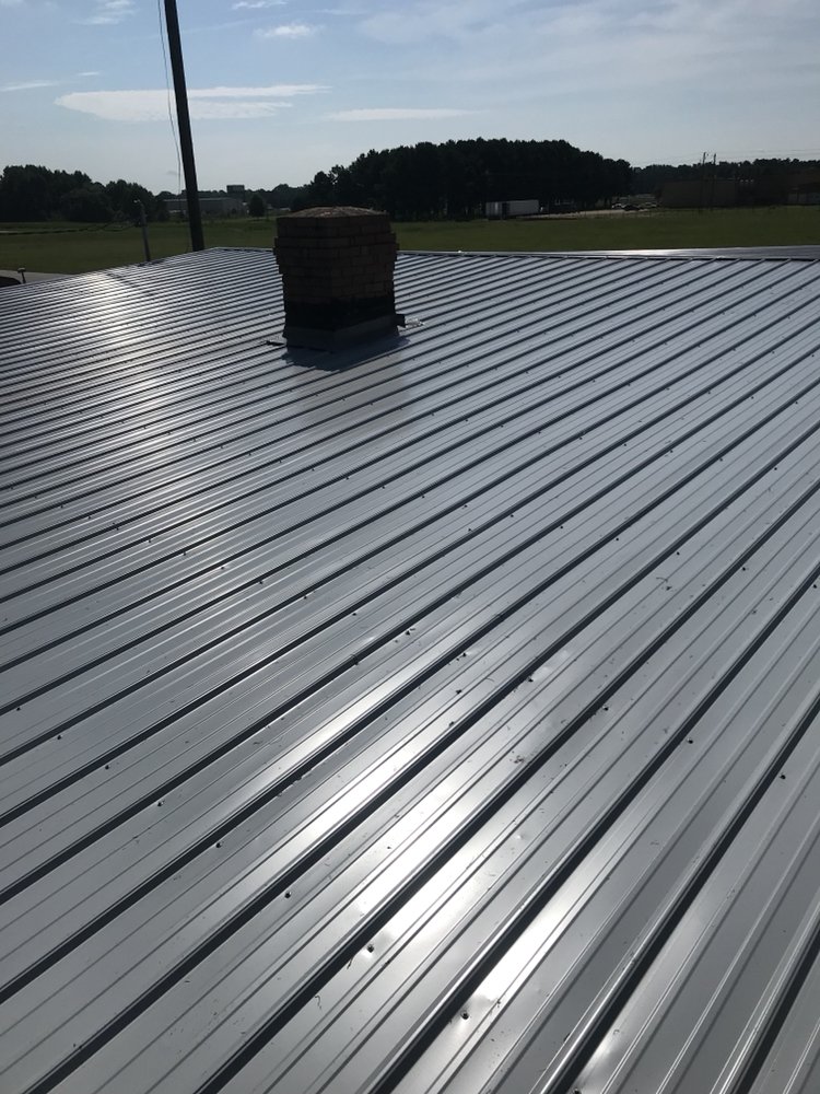 Slide of Carolina Quality Roofing