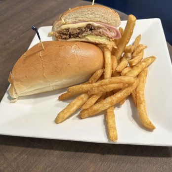 Blue Giraffe Restaurant - Cuban sandwich with fries - Seafood Near Me - Sanibel, Florida Blue Giraffe Restaurant - Cuban sandwich with fries - Seafood Near Me - Sanibel, Florida