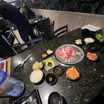 Seoul Cham Soot BBQ - a variety of food items on a table - Korean Near Me - La Canada Flintridge, California