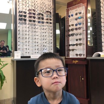 Optometry Corner - Interior with new patient - Eyewear & Opticians Near Me - Irvine, California Optometry Corner - Interior with new patient - Eyewear & Opticians Near Me - Irvine, California