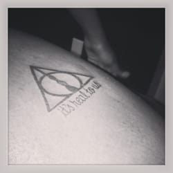 Anchor Tattoo Co - Simple Deathly Hallows tattoo. "It's real for us" is a phrase from the book "It's real to us" is a phrase from my friends and I.
