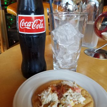 Sal Y Limon - Mexican coke made with sugar cane and chicken salad tostada appitezer - Mexican Near Me - Seattle, Washington Sal Y Limon - Mexican coke made with sugar cane and chicken salad tostada appitezer - Mexican Near Me - Seattle, Washington