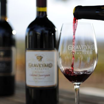 Graveyard Vineyards - a wine being poured into a glass - Wine Tasting Room Near Me - San Miguel, California Graveyard Vineyards - a wine being poured into a glass - Wine Tasting Room Near Me - San Miguel, California