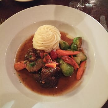 Le Voltaire - Don't remember the name of this dish but it's beef cheeks. - French Near Me - Omaha, Nebraska Le Voltaire - Don't remember the name of this dish but it's beef cheeks. - French Near Me - Omaha, Nebraska