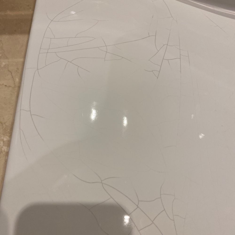Older sink with cracking Older sink with cracking
