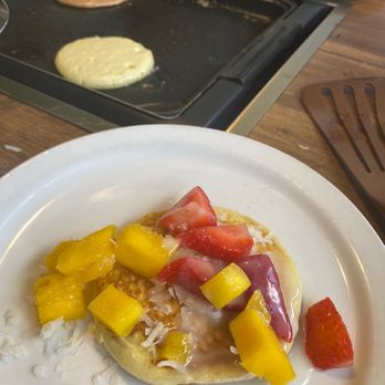 Slappy Cakes - Make your own pancake with mango, strawberry, shaved coconut, and coconut syrup. - Breakfast & Brunch Near Me - Lahaina, Hawaii Slappy Cakes - Make your own pancake with mango, strawberry, shaved coconut, and coconut syrup. - Breakfast & Brunch Near Me - Lahaina, Hawaii