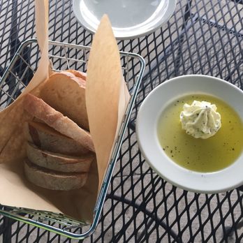This Little Pig - Fresh bread with herb butter and oil was very good! - Pizza Near Me - Clarence, New York This Little Pig - Fresh bread with herb butter and oil was very good! - Pizza Near Me - Clarence, New York