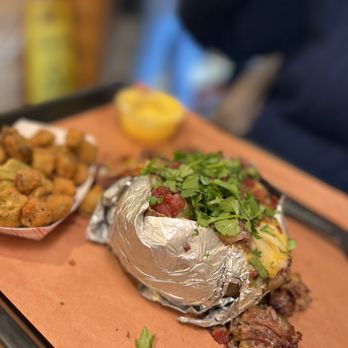 The Smoke Pit - Brisket Super Spud& fried okra - Southern Near Me - Monroe, North Carolina