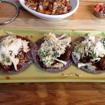 Babalu - CARNE DE CERDO Compart Family Farms smoked pork belly, chipotle-citrus BBQ sauce, roasted peanut slaw, cotija cheese. - Tapas/Small Plates Near Me - Memphis, Tennessee
