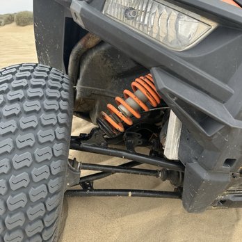Sunbuggy Fun Rentals - Other front shock that they admitted had been recently replaced. Other back 2 were white and clean like this one. - ATV Rentals/Tours Near Me - Oceano, California Sunbuggy Fun Rentals - Other front shock that they admitted had been recently replaced. Other back 2 were white and clean like this one. - ATV Rentals/Tours Near Me - Oceano, California