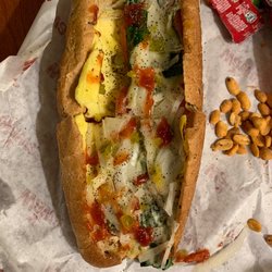 Wawa Food Markets - Egg sandwich spinach/ tomato/onions on whole wheat bread yummy....