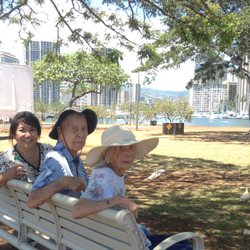 Care Options - Caregiver Lei with Mr. and Mrs. Mori
