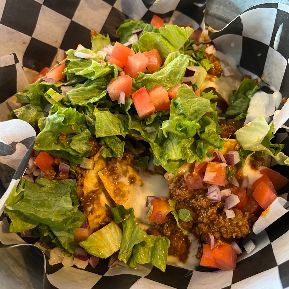 Buzz's Roost - Mini nachos - should've gone for the bigger size because these are delicious!! - Bars Near Me - Carolina Beach, North Carolina Buzz's Roost - Mini nachos - should've gone for the bigger size because these are delicious!! - Bars Near Me - Carolina Beach, North Carolina