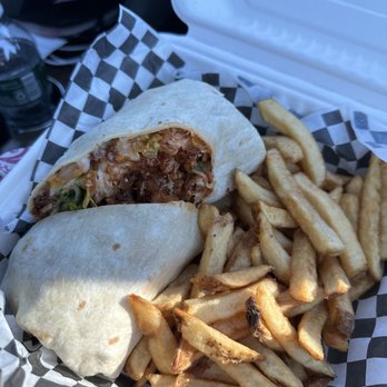 Bricks & Barley - Crispy chicken wrap dipped in medium sauce with fries. - Pizza Near Me - Niagara-on-the-Lake, Ontario