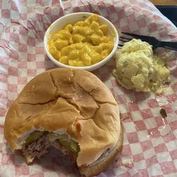 Buddy's Bar-B-Que Emory Rd - Pulled pork sandwich with Mac n cheese and potato salad.