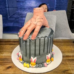 Edo's Cakes - Last-minute cake Edo made for a Wednesday Addams-themed Easter. (Nephew in the back.)